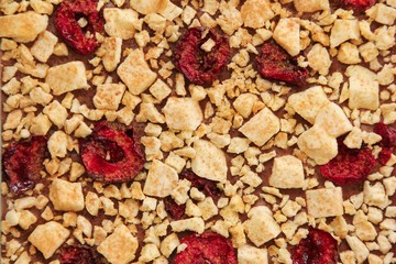 Chocolate bark with dried cherries and apples background