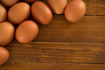 Fresh eggs on wooden table