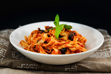 tasty pasta Italian tomato sauce pasta on the table