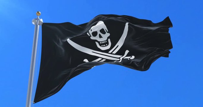 Flag pirate waving at wind in slow with blue sky, loop