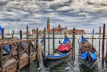 Fototapeta na wymiar Gondals moored at waterfront, Riva degli Schiavoni, with view to San Giorgio Maggiore, Venice, UNESCO World Heritage Site, Veneto, Italy, Europe