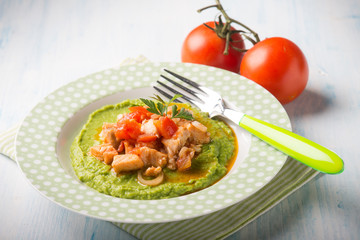 fish stew with pea cream, selective focus