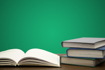 School books on the background of a school board