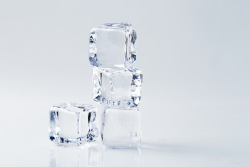 Group of ice cubes on white background.