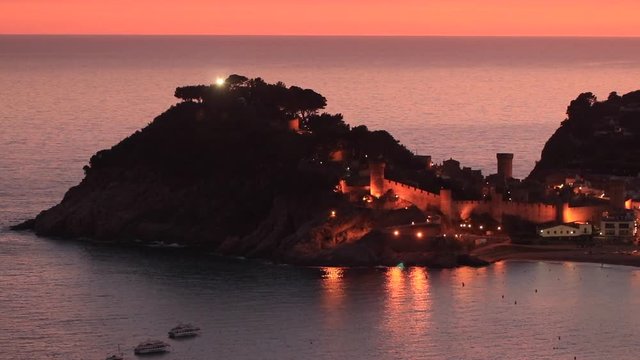 Sunset landscape of Tossa de Mar village, Costa Brava. Spain.