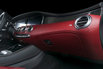 Modern Luxury car inside. Interior of prestige modern car. Comfortable leather seats. Red...