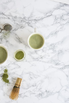 Green Matcha Latte on Marble Table