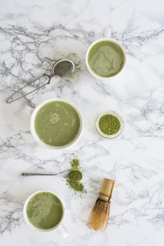 Green Matcha Latte on Marble Table