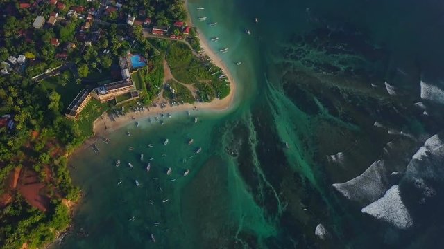 Amazing view of harbour and island coastline at sunset drone footage