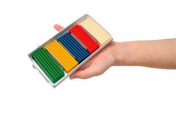 in the child's hand clay. isolated on white