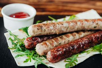 appetizing and delicious grilled meat dish with vegetables and herbs