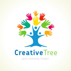 Creative tree colored hands logo template. People tree unity emblem for kids education. Family care tree vector design illustration © koltukovs