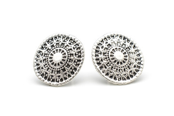 silver stud earrings isolated on white