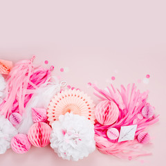 Pink and white Paper Decorations for Baby  party. Flat lay, top view