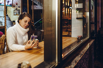 woman drink warm up tea in cafe