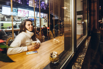 woman drink warm up tea in cafe