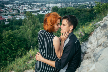 couple have a date on the peak of the hill