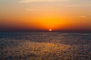 Beautiful sunset above the sea. sunset sky background