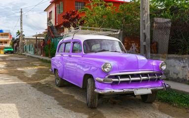 Classic Purple Car on a Street in Cuba
