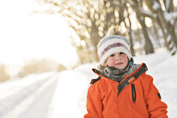 Fototapeta na wymiar Cute boy in winter season