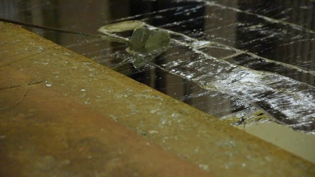hot dip galvanizing. Industrial worker against the background of a bath with liquid zinc