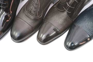 Men shoes in a row eith copy space