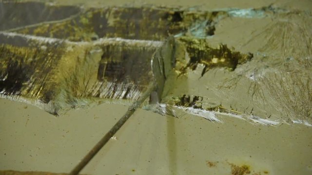 hot dip galvanizing. Industrial worker against the background of a bath with liquid zinc