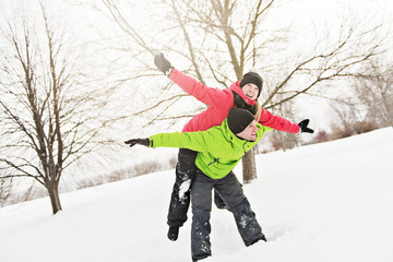 Fototapeta na wymiar Couple on winter, man with his girlfriend