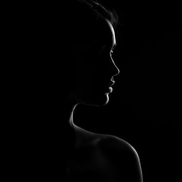 Fototapeta silhouette of beautiful young woman
