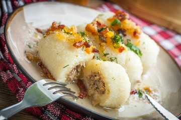 Potato dumplings stuffed with minced meat.