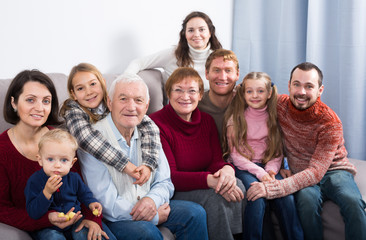 Fototapeta premium Positive family making numerous photos