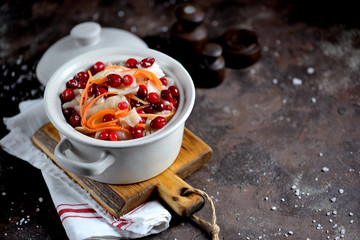 White cabbage marinated with carrots, apples and cranberries.