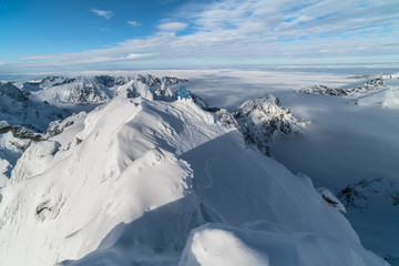 Fototapeta na wymiar Sunny day in winter snowy Tatra mountains in Slovakia