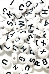 plastic beads with letters