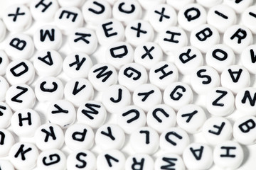 Fototapeta na wymiar plastic beads with letters