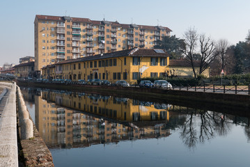 view of Trezzano sul naviglio reflected on the canal