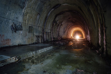 Old abandoned flooded drainage tunnel