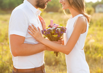 Man doing on the nature engagement girl, surprise, emotion, at sunset in St. Valentine's Day
