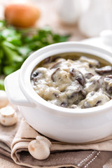 Mushrooms in creamy sauce, julienne. Champignon