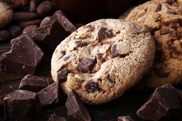 Chocolate cookies on wooden table. Chocolate chip cookies shot.