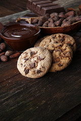 Chocolate cookies on wooden table. Chocolate chip cookies shot.