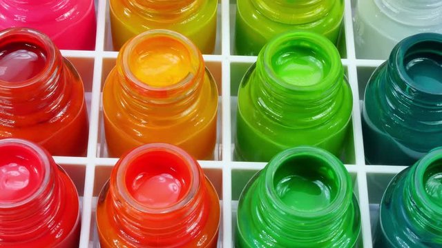 Poster paint is a distemper paint that usually uses a type of gum water or glue size as its binder. It is normally a cheap paint used in theatrical backdrops or in grade school art classes.
