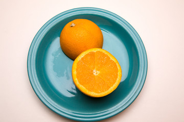 orange with blue plate on white background