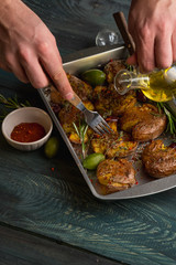 Crash smashed potatoes cooked in baking tray with bread. Step homemade recipe.