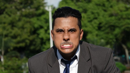 Business Man Making Funny Faces