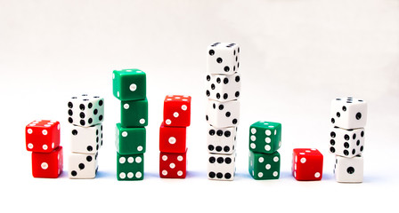 Several Stacks of Red, Green, and White Dice Cubes