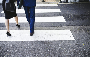People crossing a city road