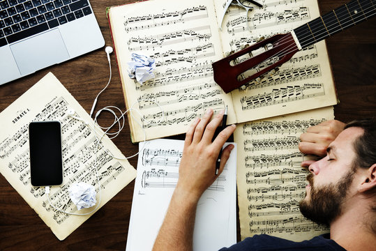 Man working with musical notes
