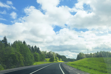 Asphalt road in a sunny summer day