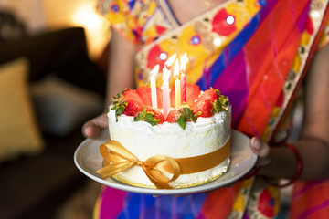 Indian family celebrating a birthday party